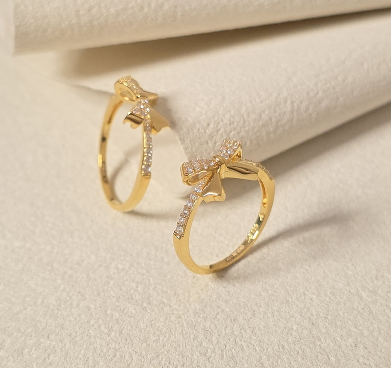 Nhẫn Nơ Kết Tấm Trơn 16K